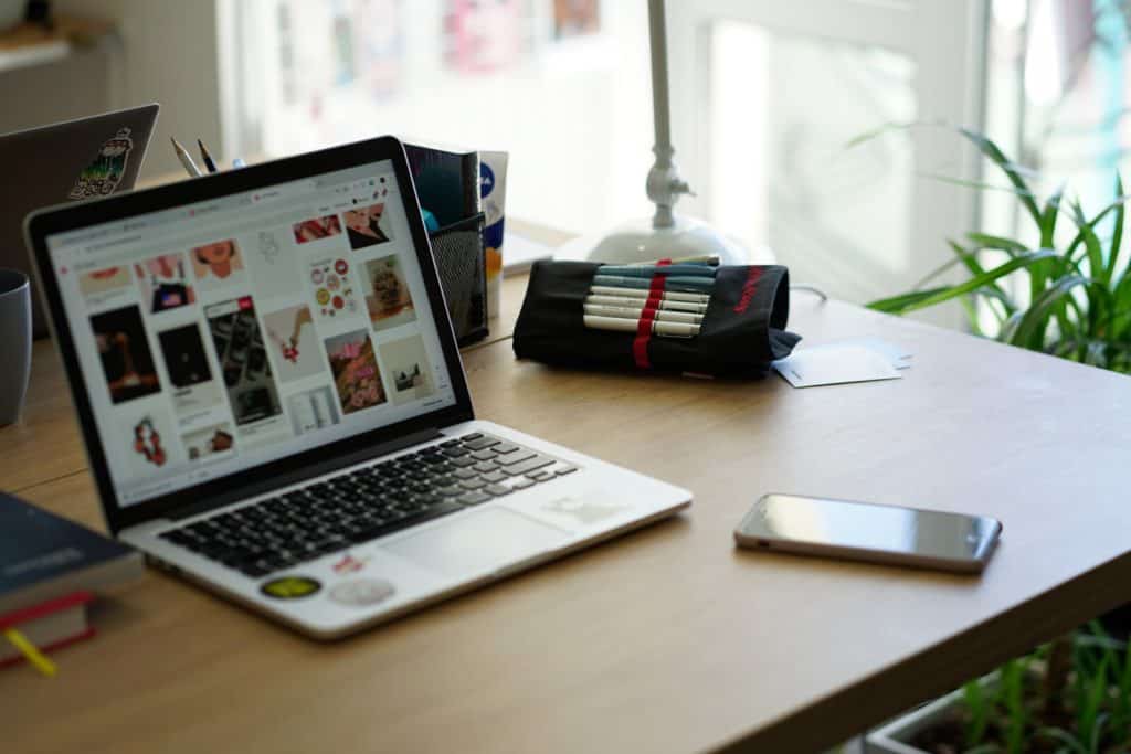 A laptop on a desk.